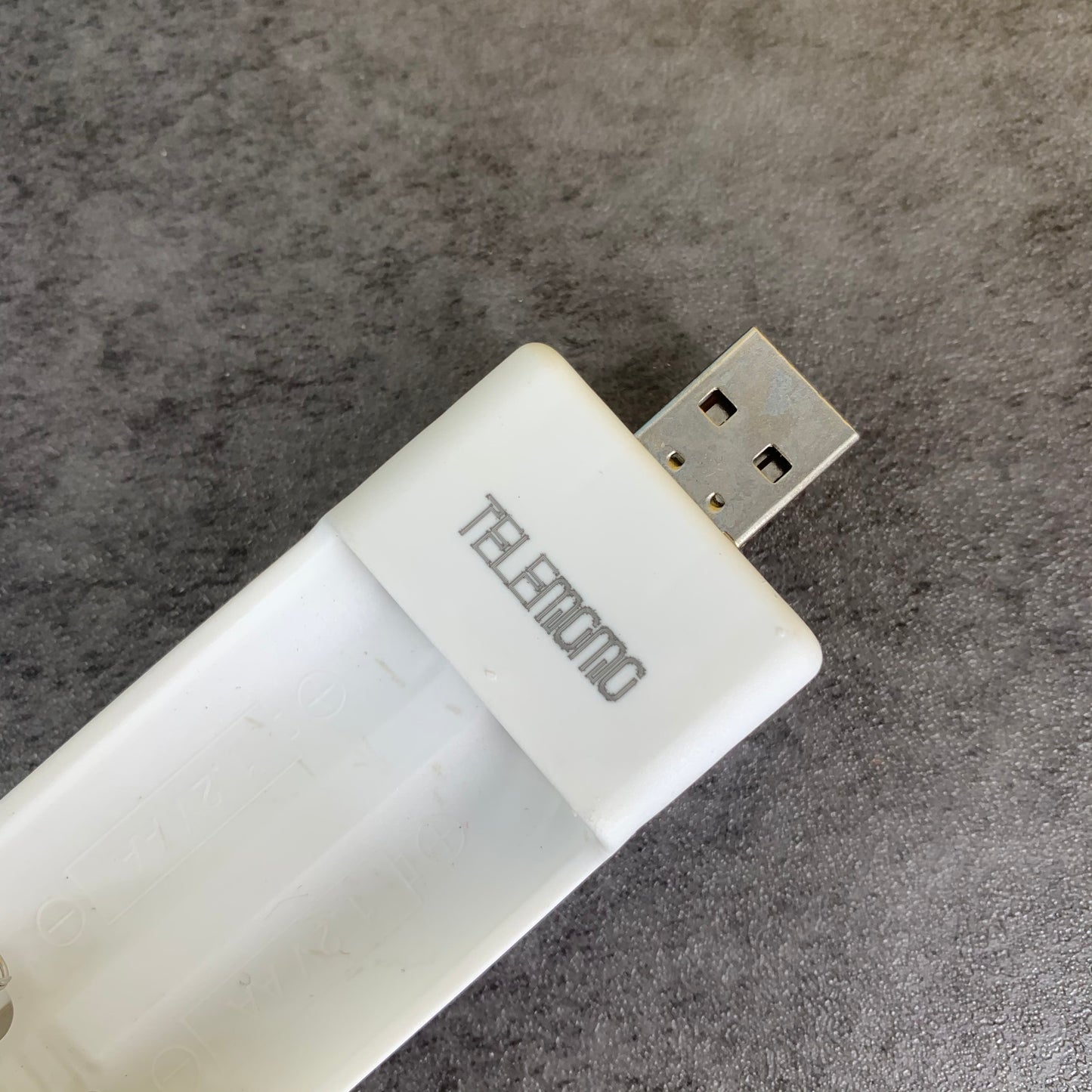 TELEMOMO Strong and Durable White Battery Charger